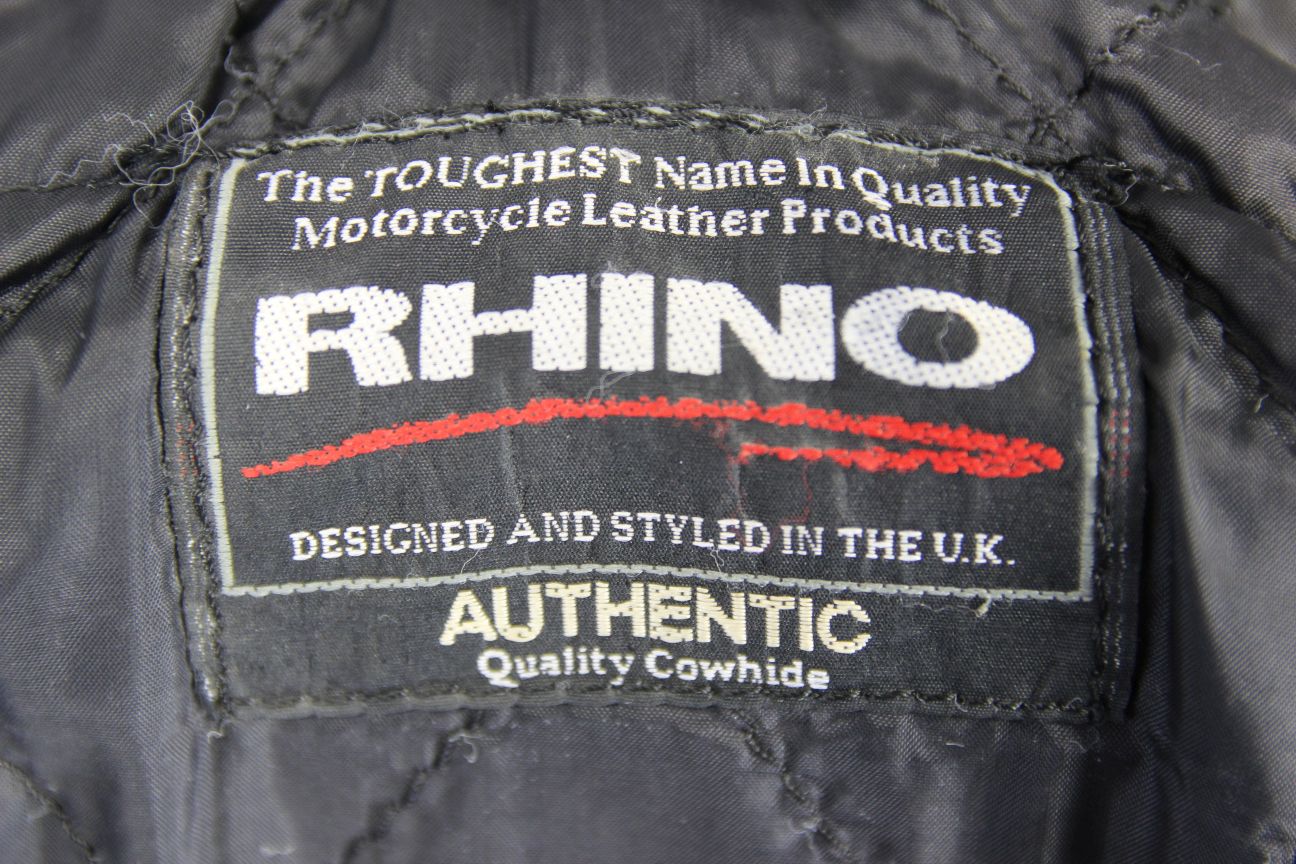 RHINO BRITISH DESIGNED BLACK COWHIDE LEATHER BIKER JACKET + PROTECTORS: SIZE 10